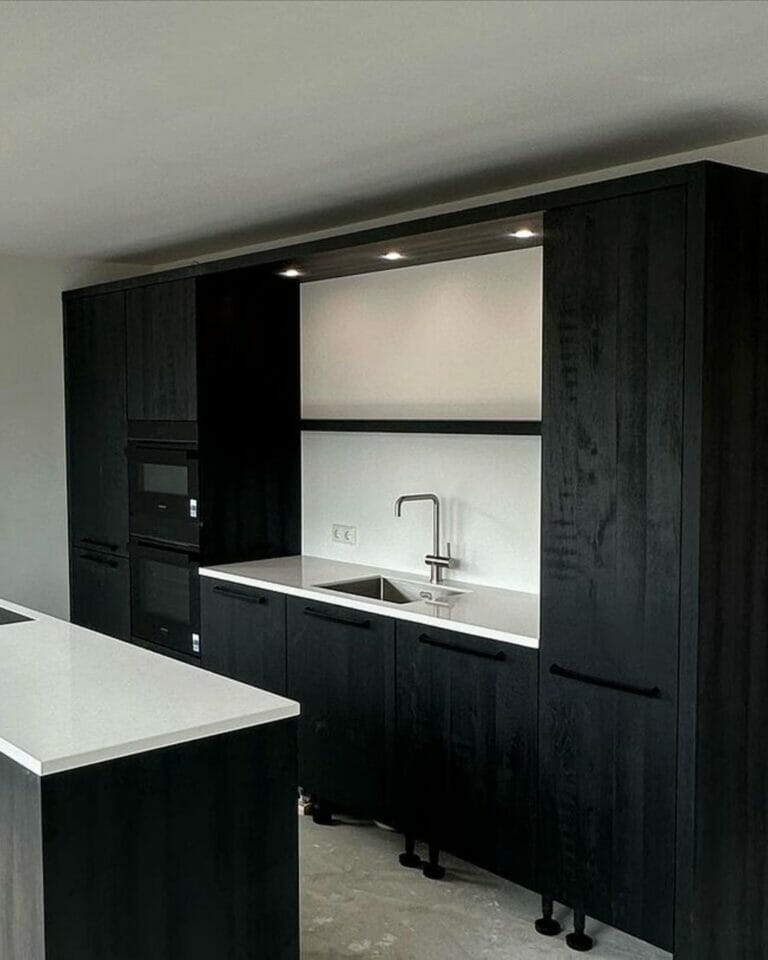 Completed installations of cabinets and countertops in the kitchen