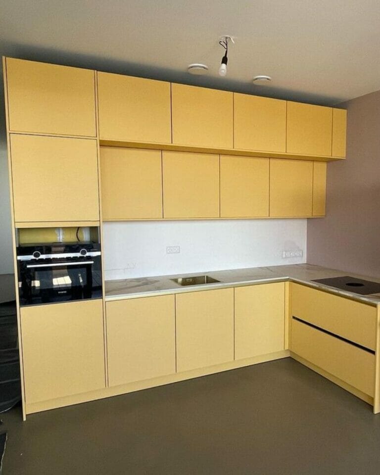 Yellow cabinet installations for a kitchen project
