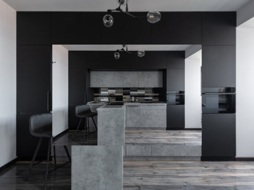 Moderne Küche mit dunklen Schränken, grauen Arbeitsplatten und einer gefliesten Rückwand. Mit einer zentralen Insel mit Barhockern und einer Deckenlampe, alles in einer schlanken monochromen Farbpalette.