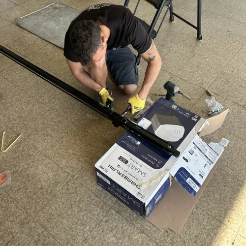 Garage Door Repair Pacific City 7 a carlos garage door technician working on a garage door opener