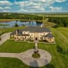 Here+is+a+drone+real+estate+photo+of+a+gorgeous+7,000+square+foot+mansion+located+in+Mustang,+Oklahoma