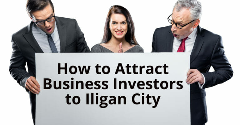 Tatlong tao ang excited na may hawak na sign: Paano Makaakit ng mga Business Investors sa Iligan City para sa website ng Iligan.