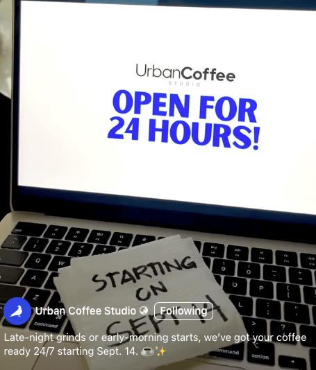 Ipinapakita ng laptop ang "Urban Coffee Studio: 24/7 Operations Starting September 14!" sa screen.