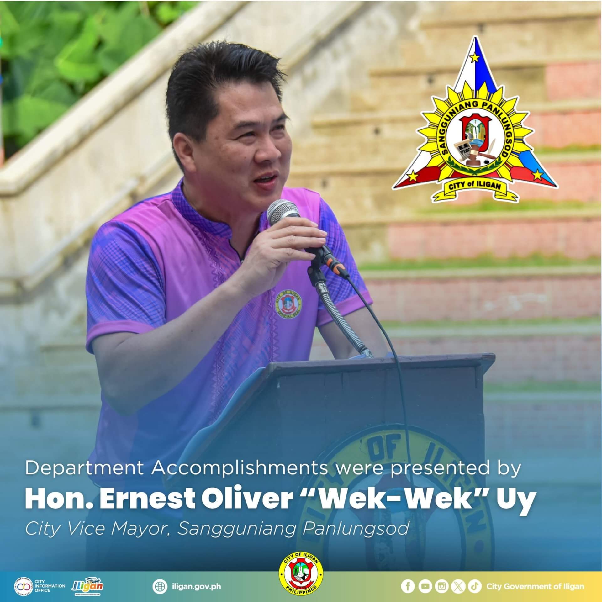 city vice mayor uy speaks at a podium outdoors, wearing a purple shirt, city seal and text overlayed.