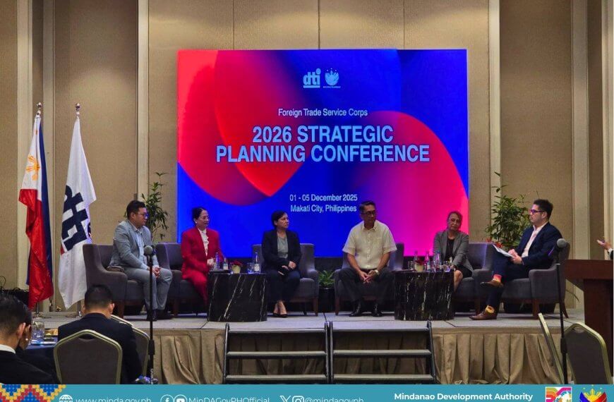 six people discuss agri growth onstage at the 2026 strategic planning conference, with a large screen behind.