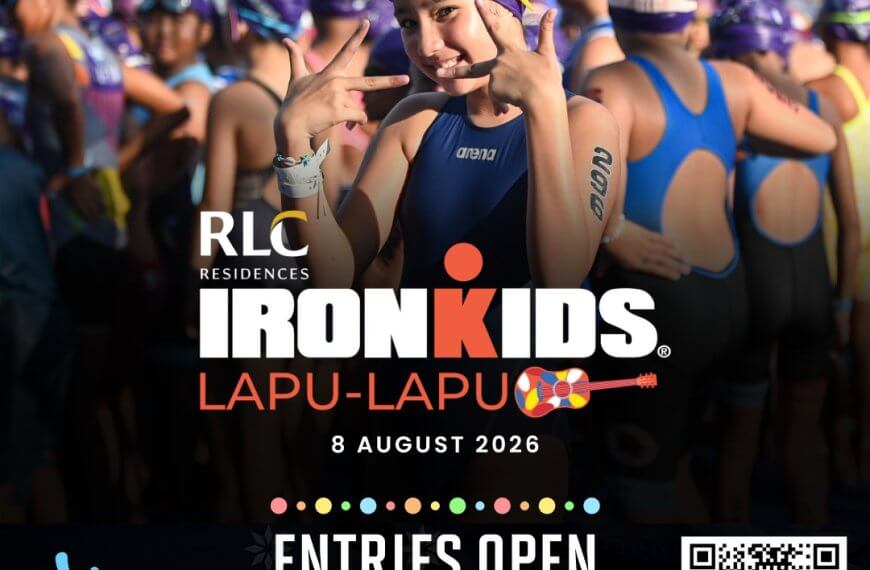 a smiling girl in a blue swim cap poses at a crowded triathlon event; “ironkids” details overlay the image.