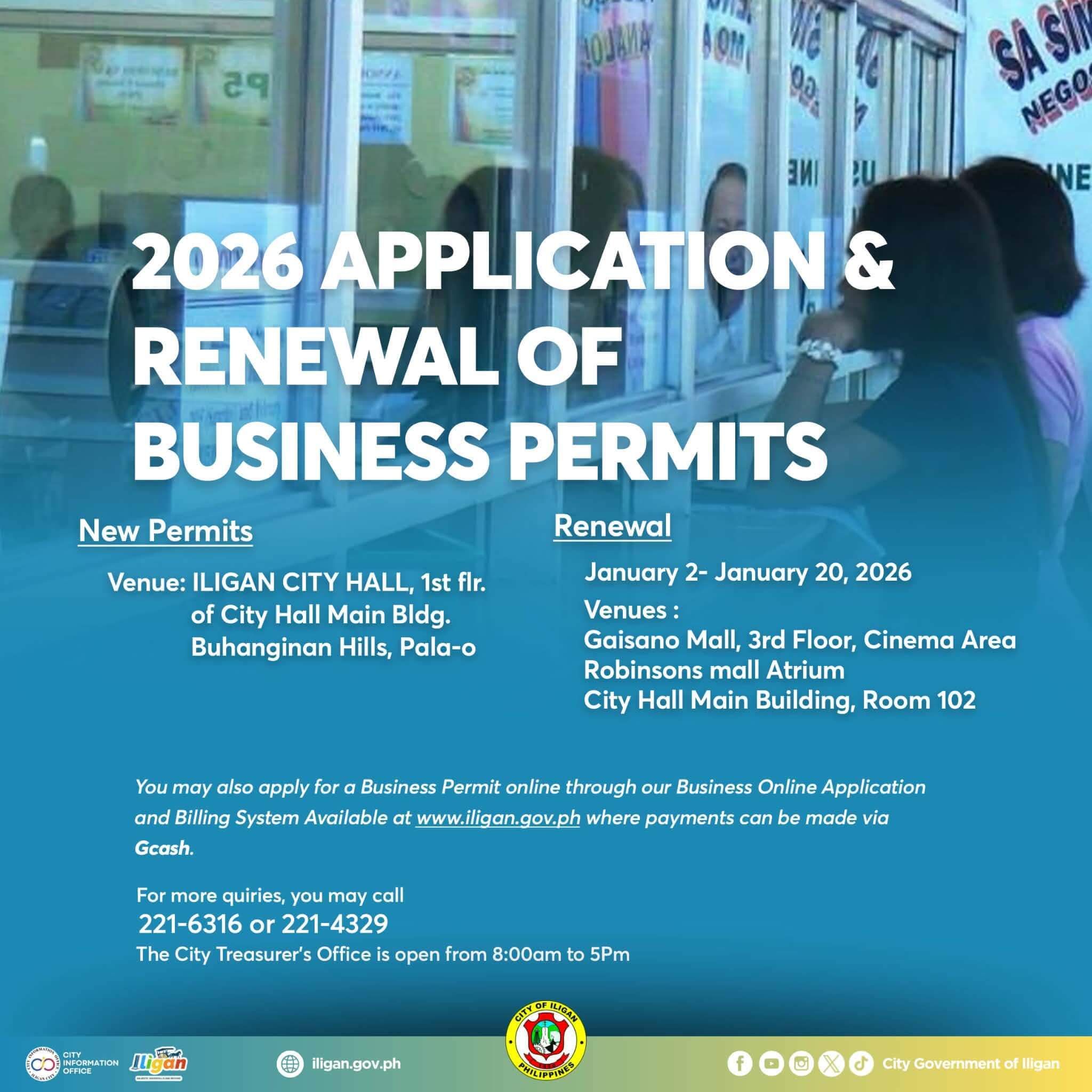 people queue at a service counter with glass dividers, applying for and renewing business permits in iligan city.