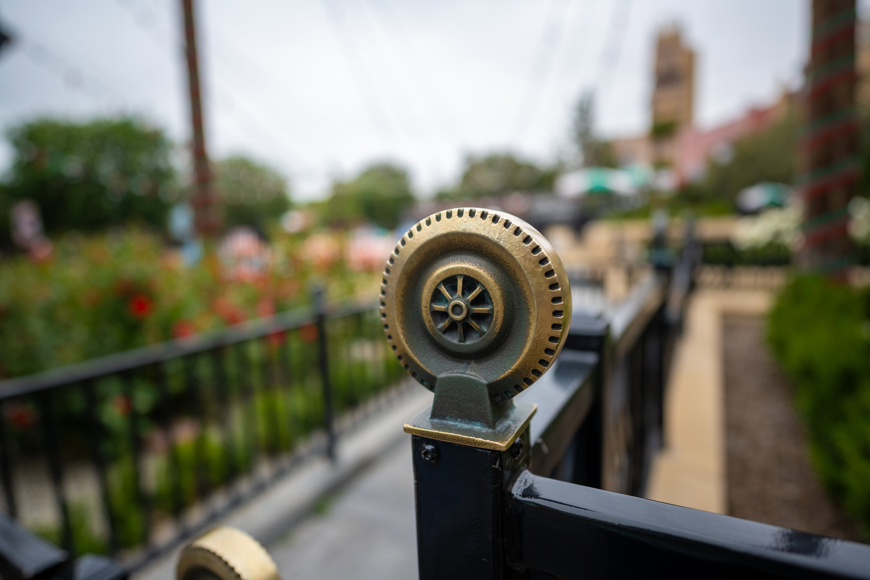 Wheel detail on the black gate in Cars Land at Disney California Adventure.