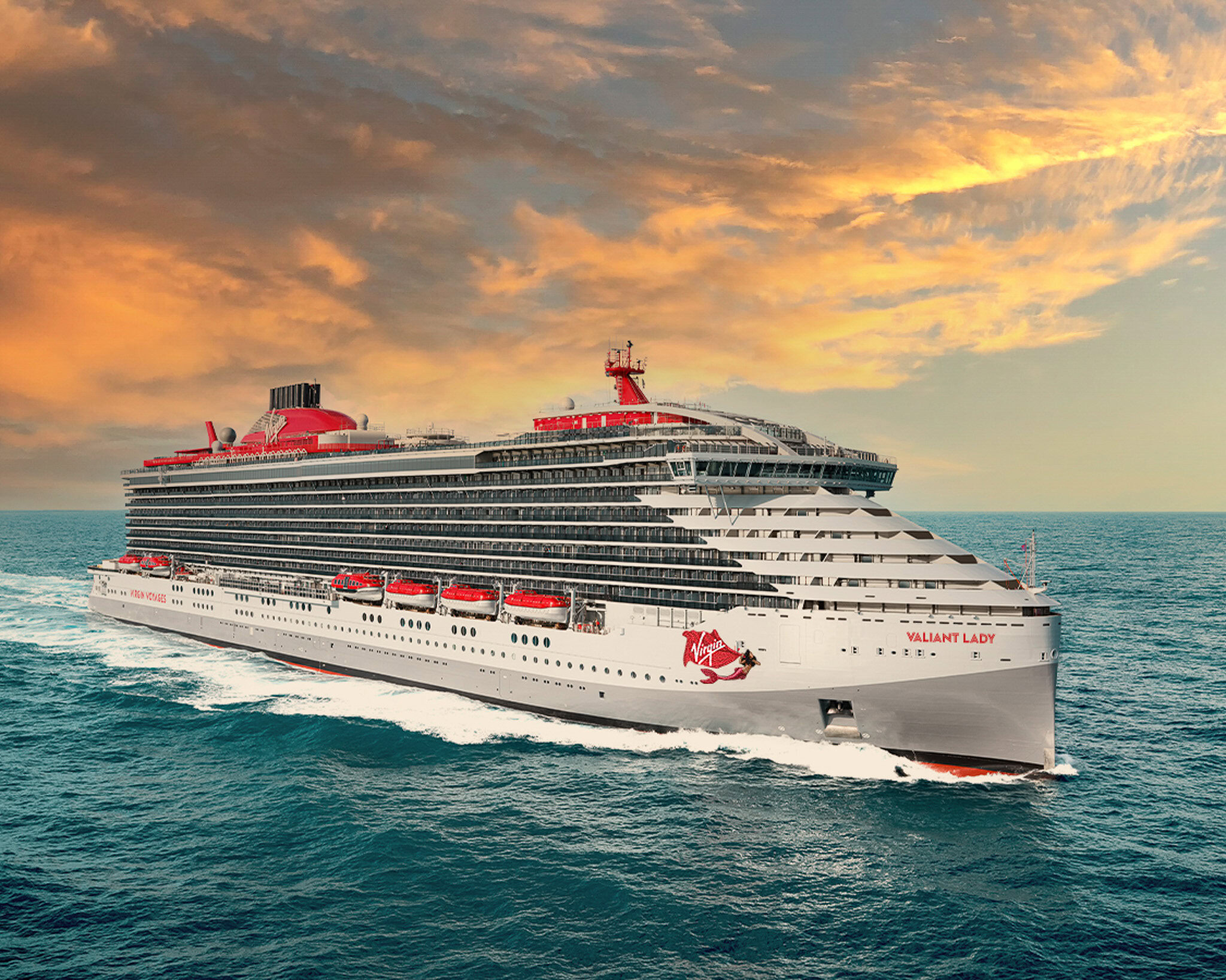 Virgin Voyages Valiant Lady cruise ship at sea during sunset