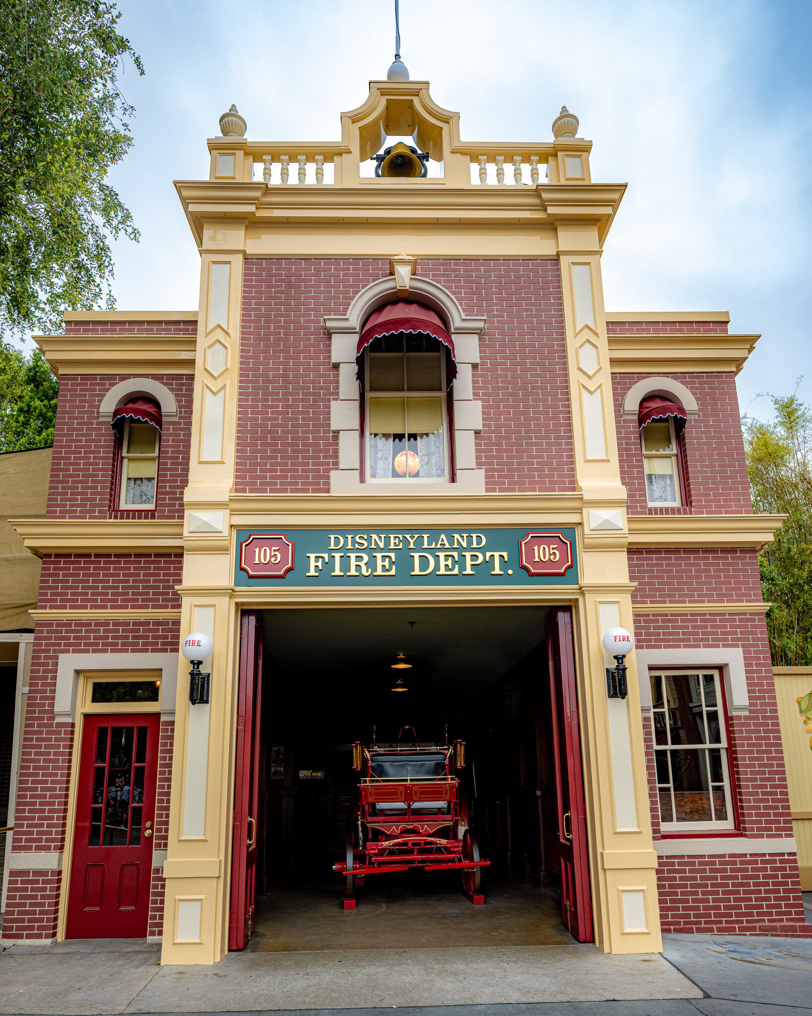 Disneyland Fire Department building with antique fire engine and Walt Disney’s apartment window above