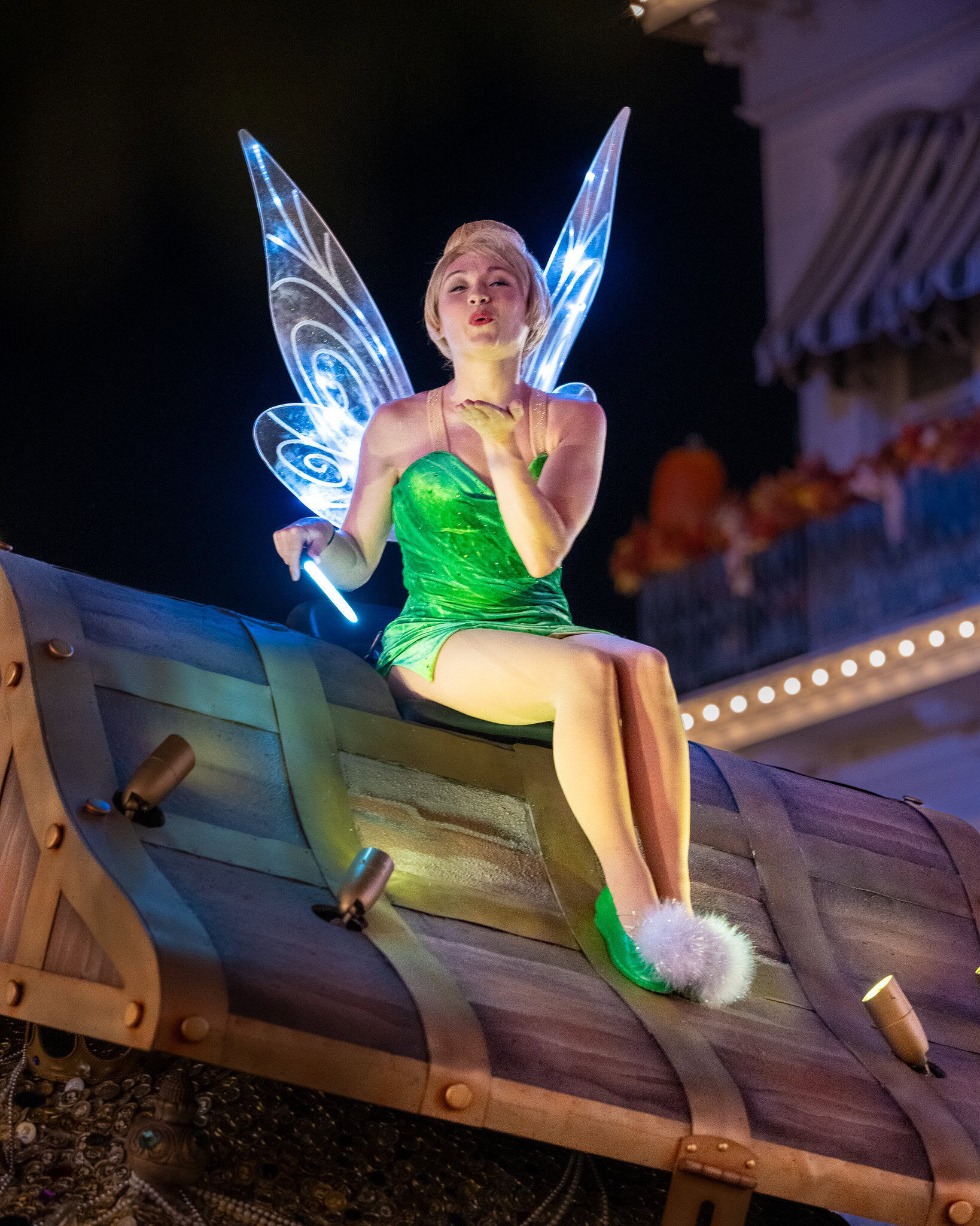 Tinker Bell waving and blowing a kiss during Mickey’s Not So Scary Halloween Party Boo to You Parade.