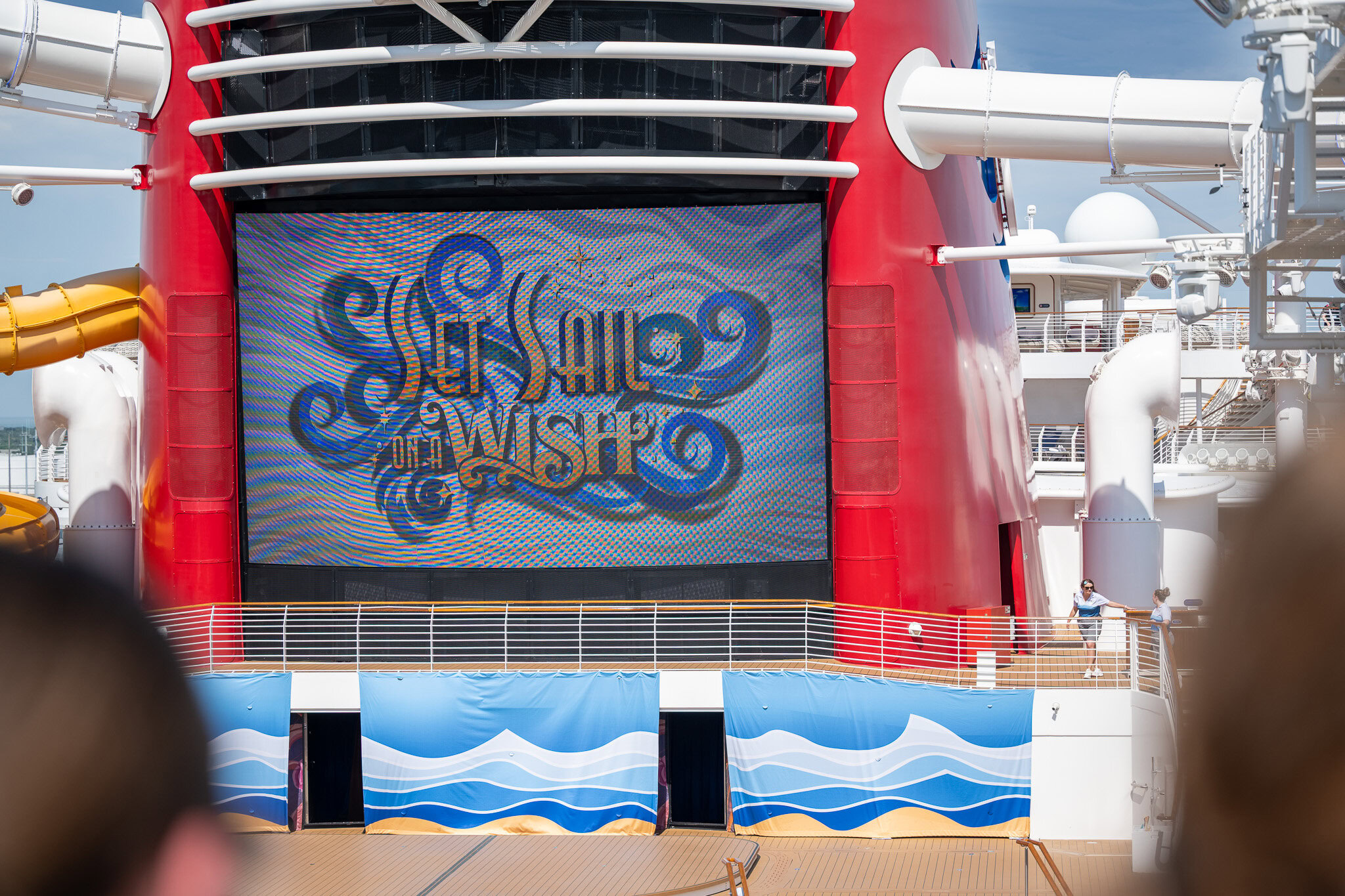 View of Castaway Cay and Disney Wish deck from Currents Bar


