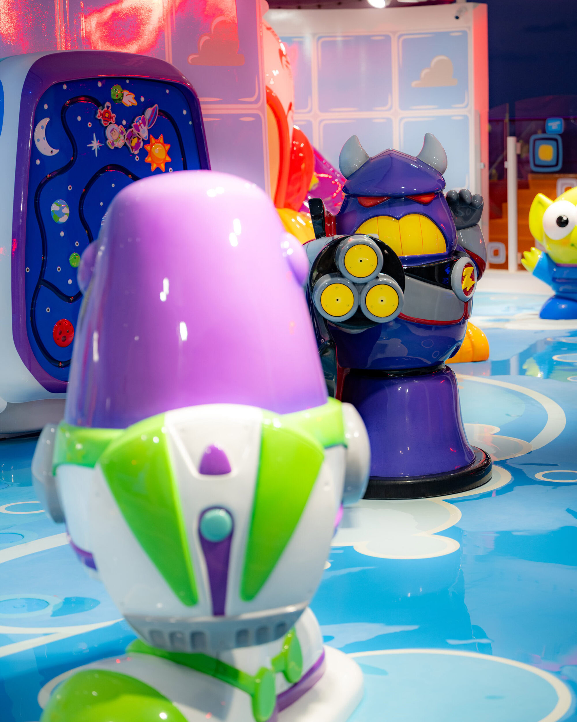 Buzz Lightyear and Emperor Zurg figures in the Toy Story Splash Zone on the Disney Wish.