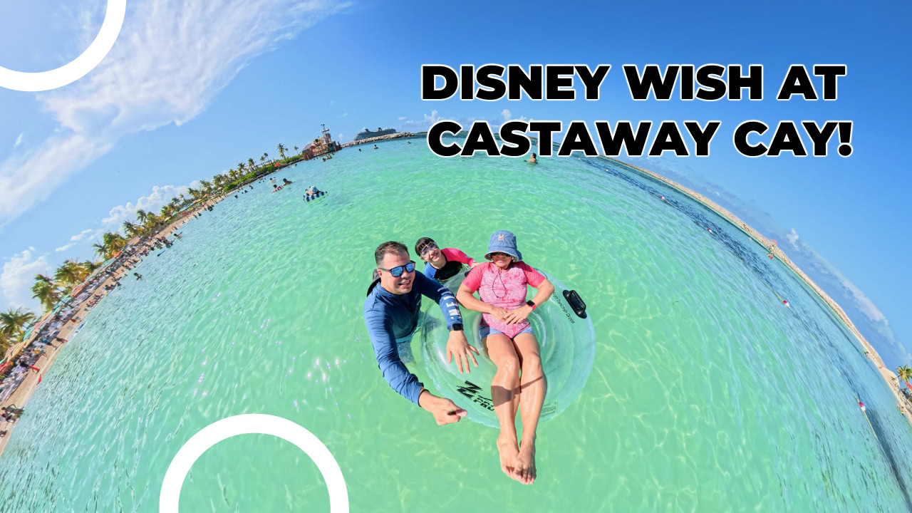 Family floating at Castaway Cay with Disney Wish in the background