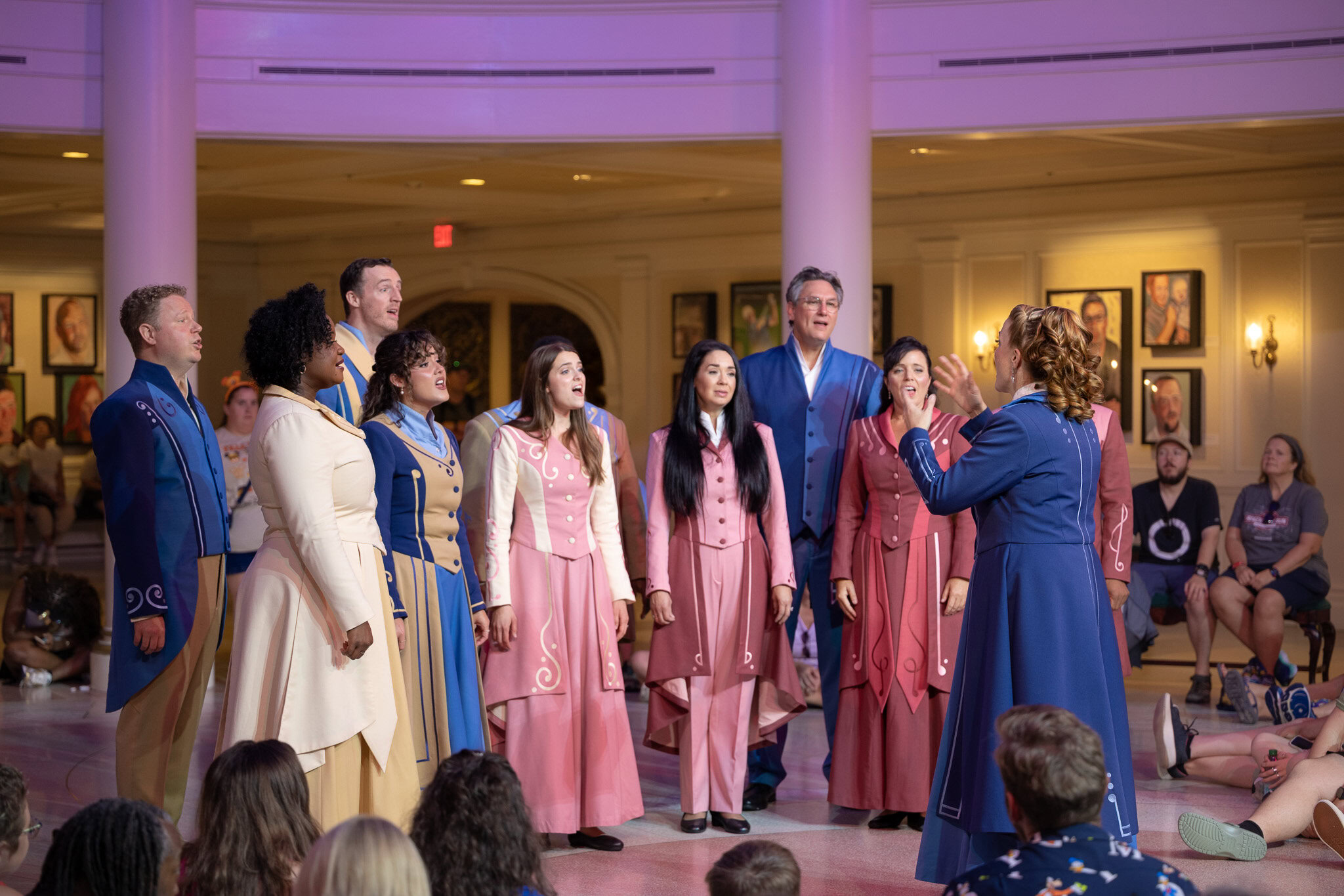 Full Voices of Liberty ensemble performing at EPCOT American Pavilion