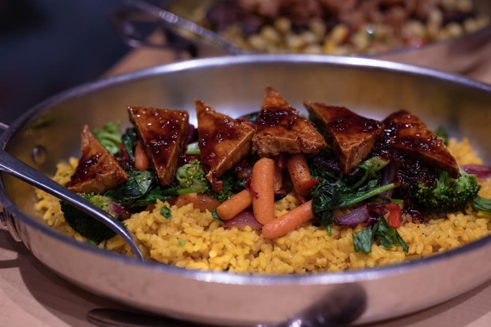 A delicious, featuring glazed, fresh vegetables, and saffron, crafted by