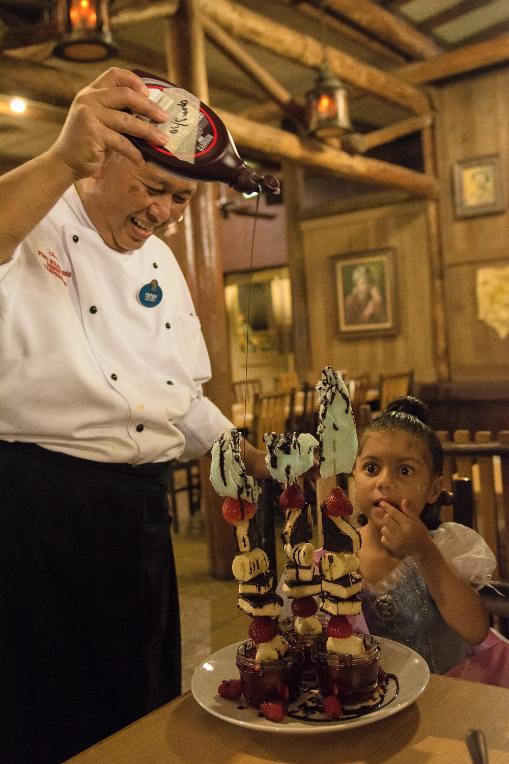 Chef TJ, a well-known, joyfully pouring, with a