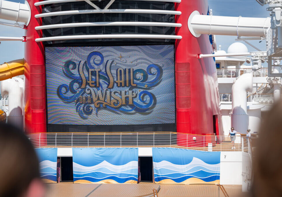 View of Castaway Cay and Disney Wish deck from Currents Bar