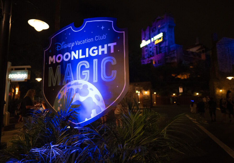 Disney Vacation Club Moonlight Magic sign with Tower of Terror in background