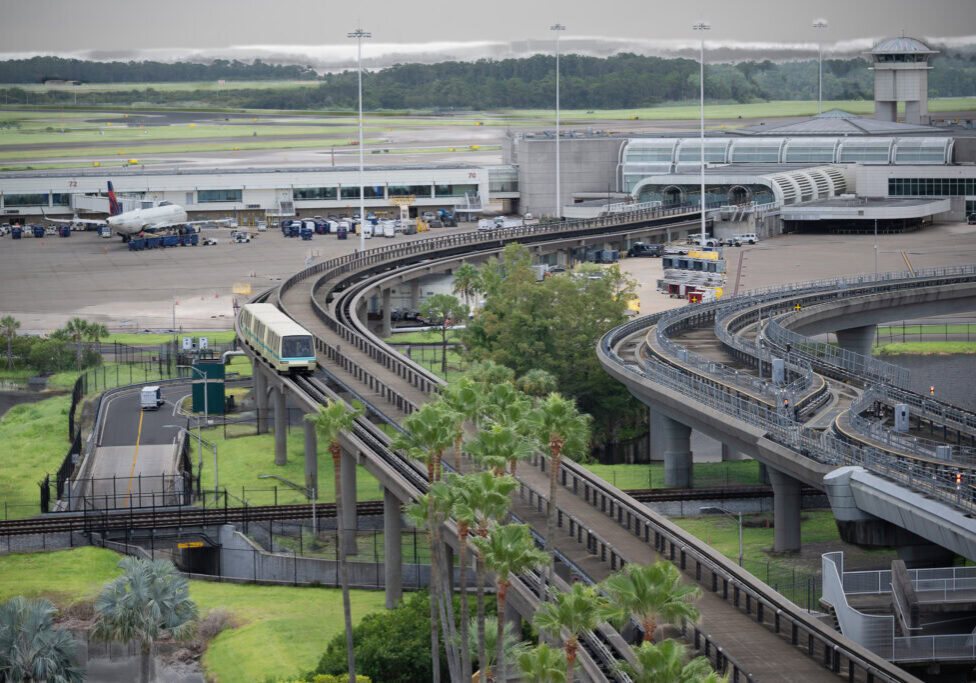 Orlando International Airport tram traveling toward main terminal