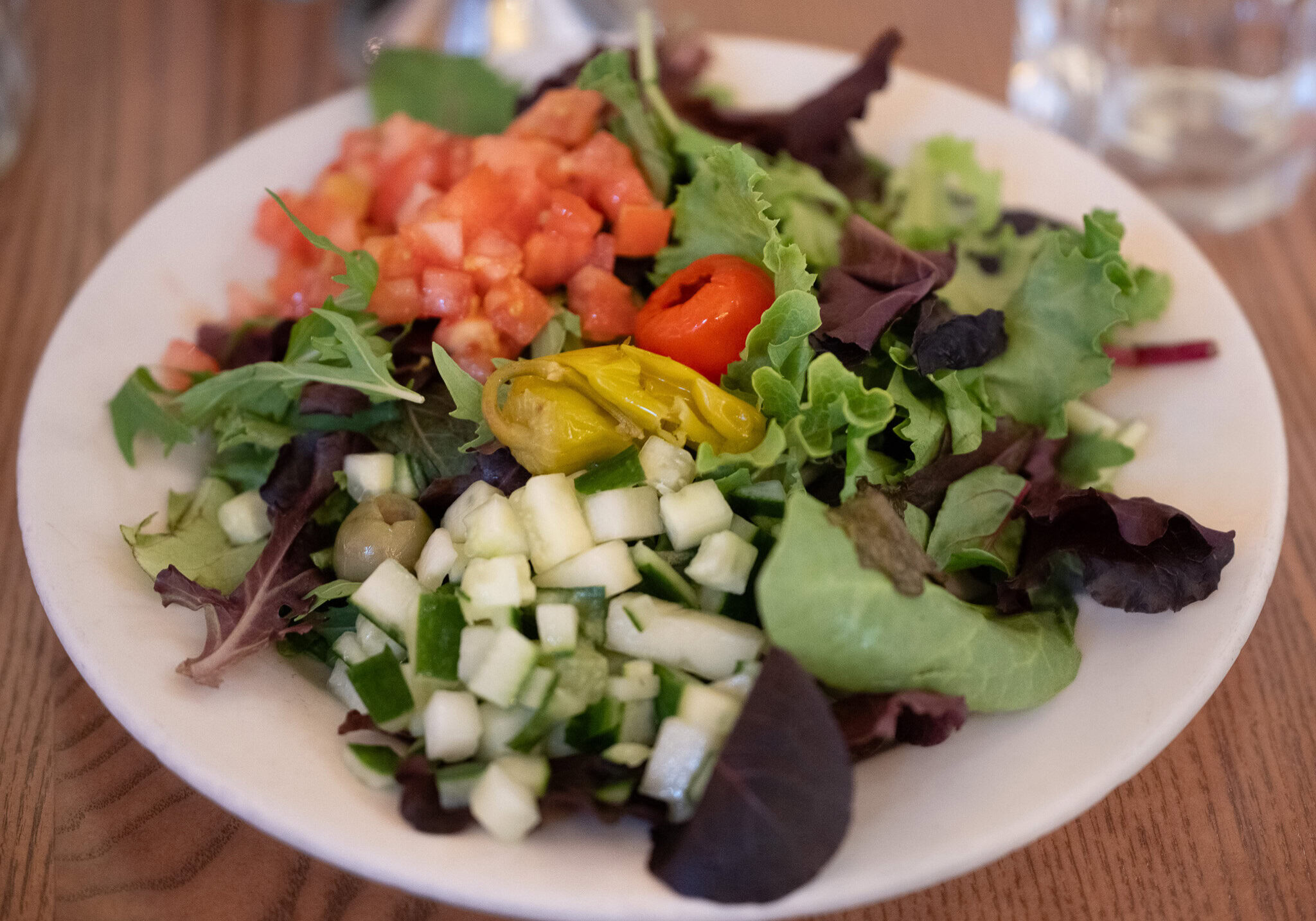 Fresh garden salad with diced vegetables served at Via Napoli EPCOT