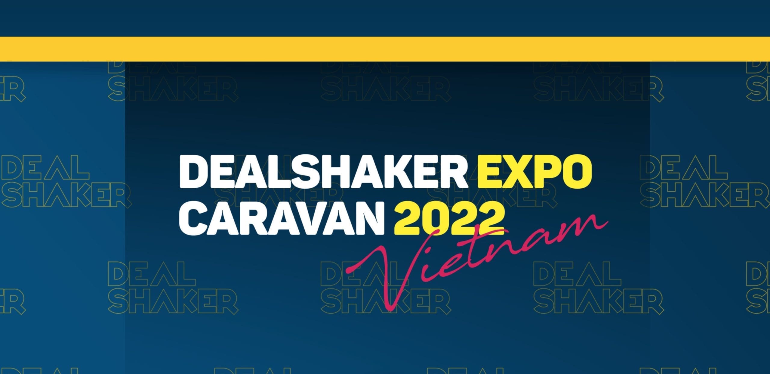 Spanduk "DealShaker Expo Caravan 2022 Vietnam" dengan teks warna-warni tebal dengan latar belakang biru tua.
