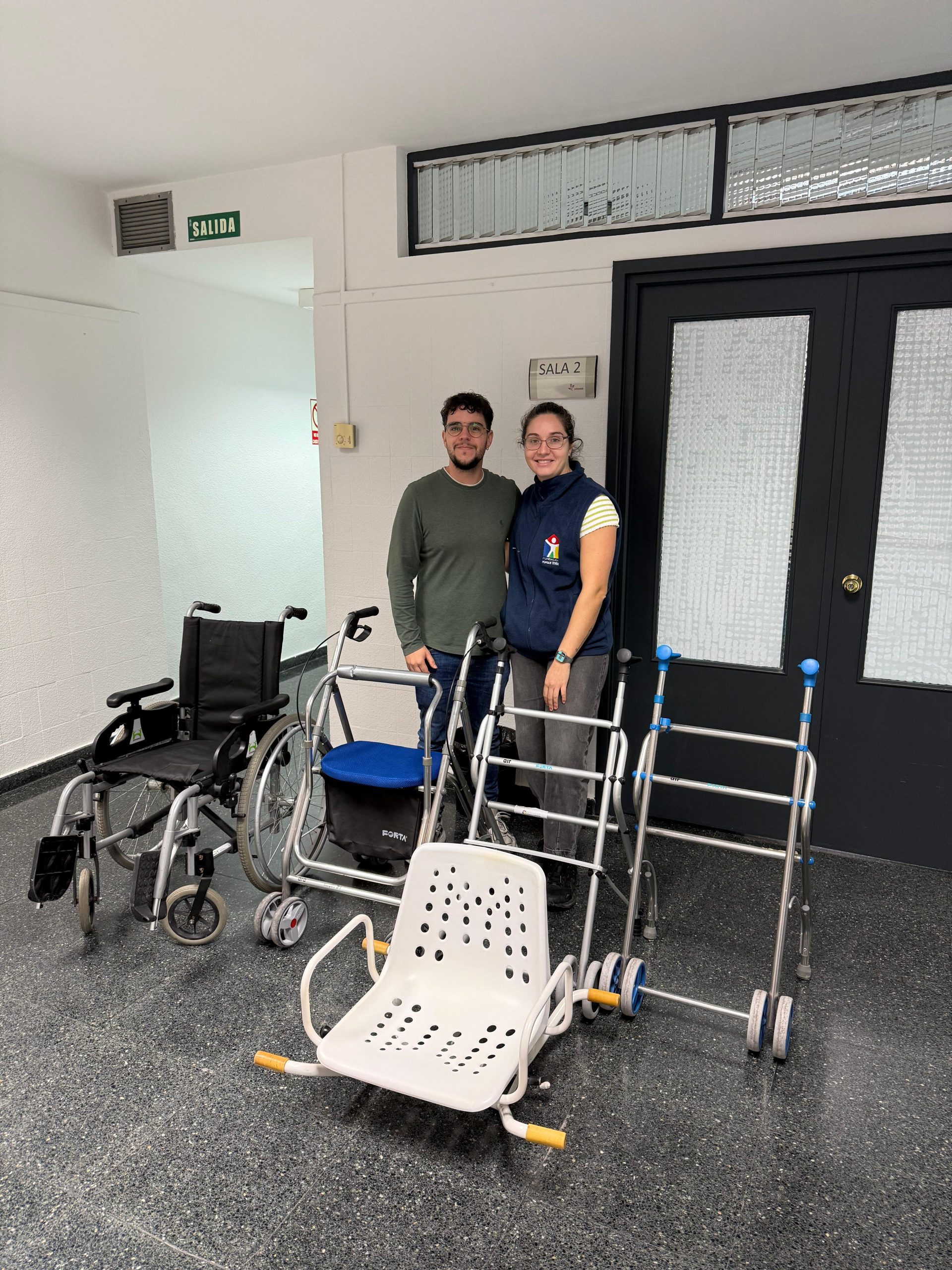 two people together with several mobility and assistance teams