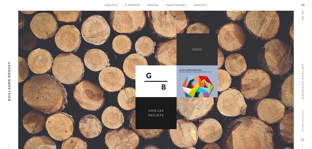 An interactive website design with newspapers in the background.
