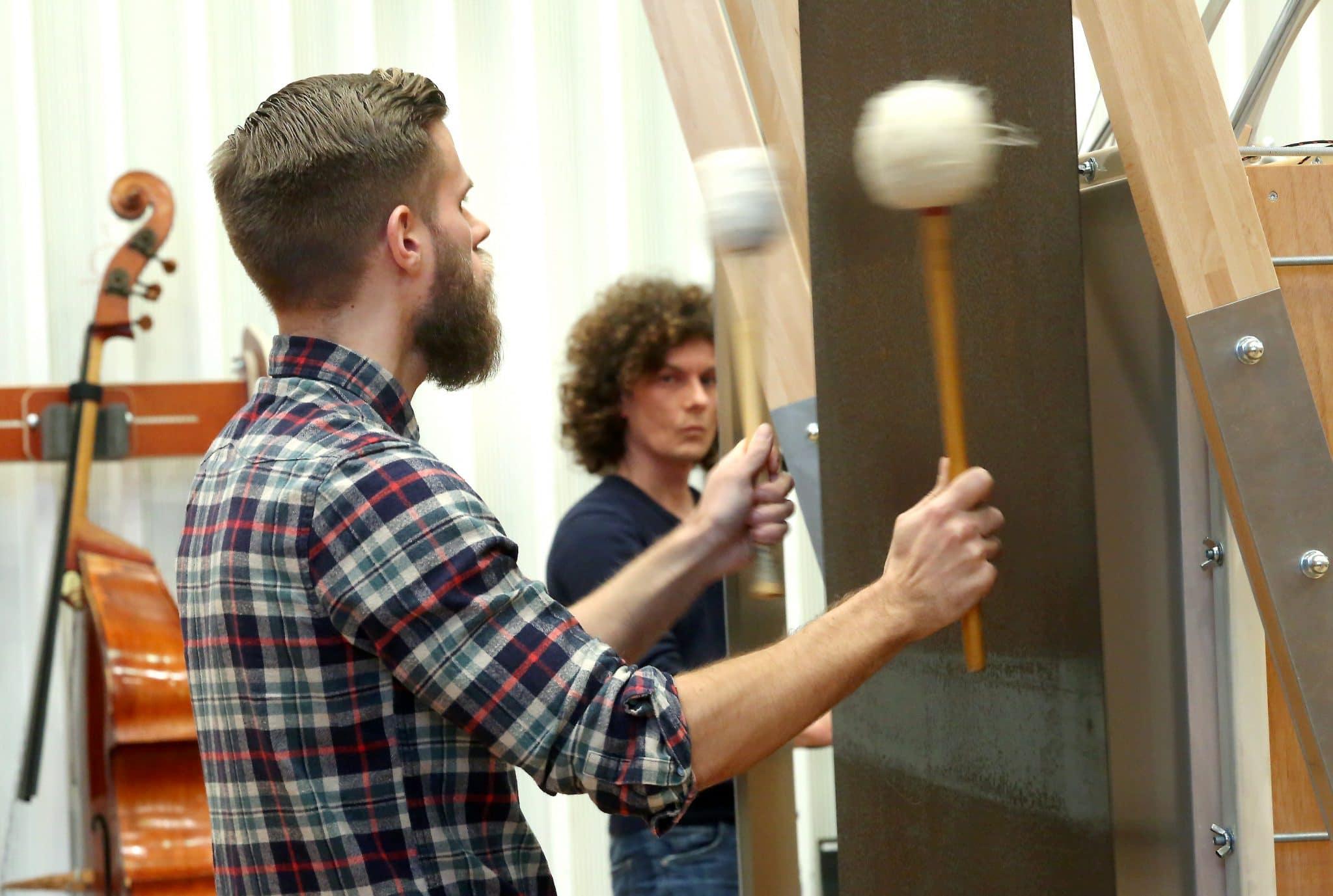 A man is venomous in a room.