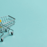 A WooCommerce shopping cart on a blue background.