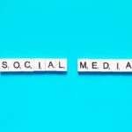 A blue background displays the word "social media" in an eye-catching manner.
